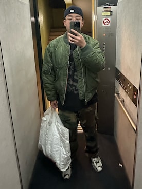 「アイテム（スニーカー）」を使った、smashboyさん（メンズ・177cm）の冬コーディネート