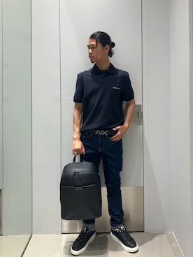 「ARMANI EXCHANGE（アルマーニエクスチェンジ）の【A|X アルマーニ エクスチェンジ】ツートーンレース スニーカー（EC限定カラー含）（スニーカー、ブラック系）」を使った、TAKUYAさん（メンズ・174cm）の春コーディネート
