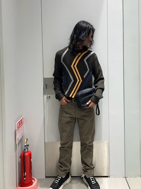 「アイテム（ポーチ）」を使った、TAKUYAさん（メンズ・174cm）の冬コーディネート