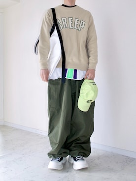 橋本さんの「実物 新品 デッドストック オーストリア軍 ファティーグカーゴパンツ」を使ったコーディネート