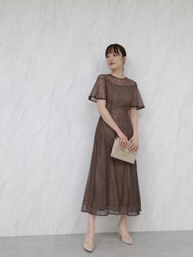「アイテム（クラッチバッグ）」を使った、藤井さん（レディース・166cm）の冬コーディネート