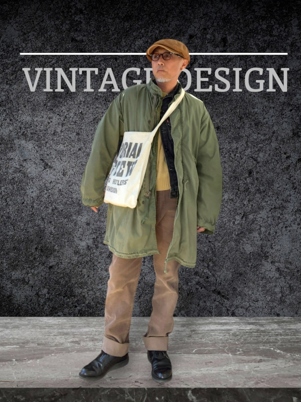 ブラック系のブーツ、ブラウン系のその他パンツ、グリーン系のモッズコートを着用したメンズの冬コーディネートの1枚目の写真