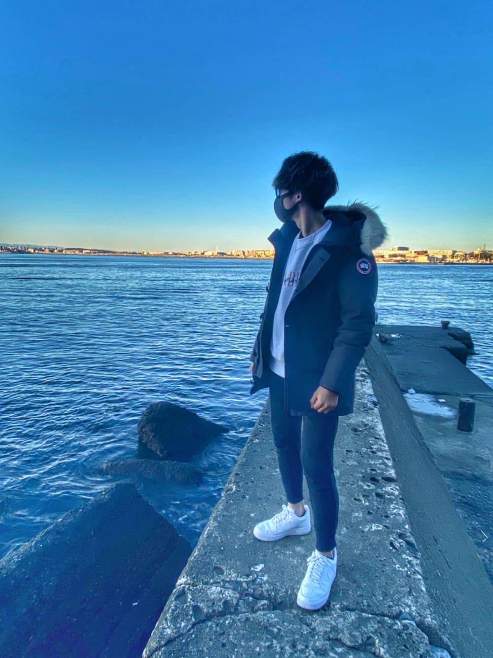 「CANADA GOOSE、GU、NIKE、UNIQLO、大人カジュアル、キレイめ、カジュアル、ootd」｜「GUのアイテム（スウェットパンツ、ブラック系）」を使った、りくとさん（メンズ・171cm）の冬コーディネートの1枚目の写真