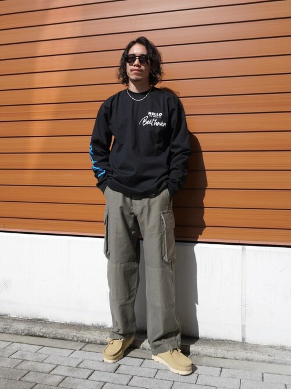 「カットソー、サングラス、カーゴパンツ、レザーシューズ、ミリタリーパンツ」｜「WPのWP / ダブリューピー：WP×CAMBER WORLD GREATS B2 L/Tee：WP11-LT03[WAX]（Tシャツ/カットソー、ブラック系）」を使った、ARKnets STAFFさん（メンズ・169cm）の春コーディネートの1枚目の写真