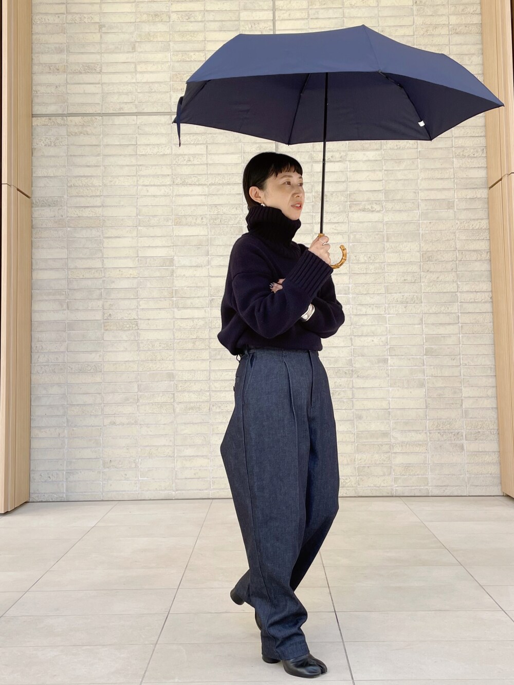 yumiii｜Traditional Weatherwearの折りたたみ傘を使った  