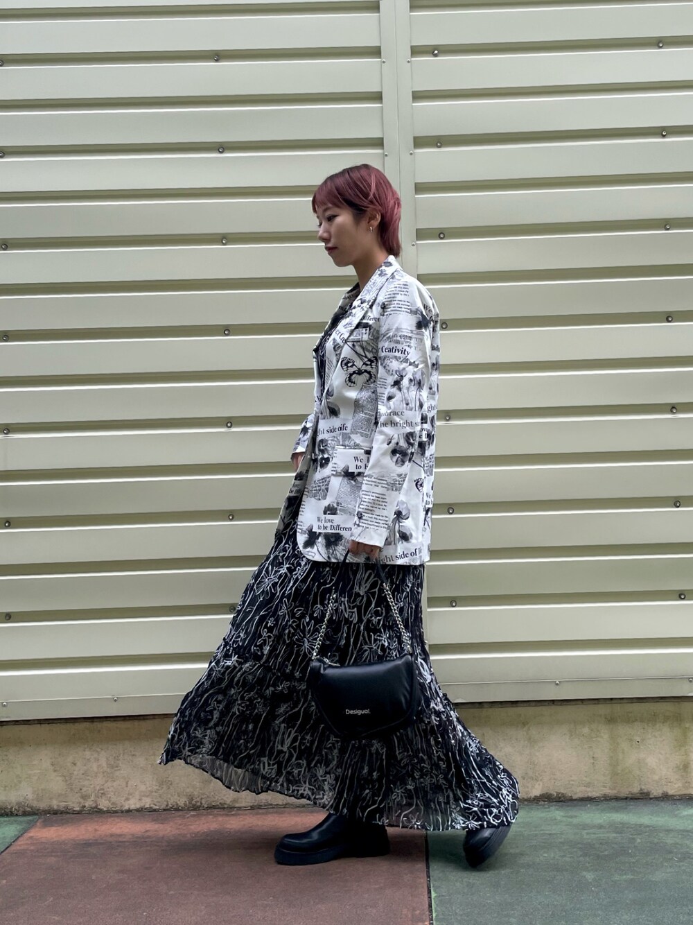Desigual（デシグアル）の「【ユニセックス】テキストと花柄の