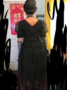 Xinyi Liさんのコーディネート