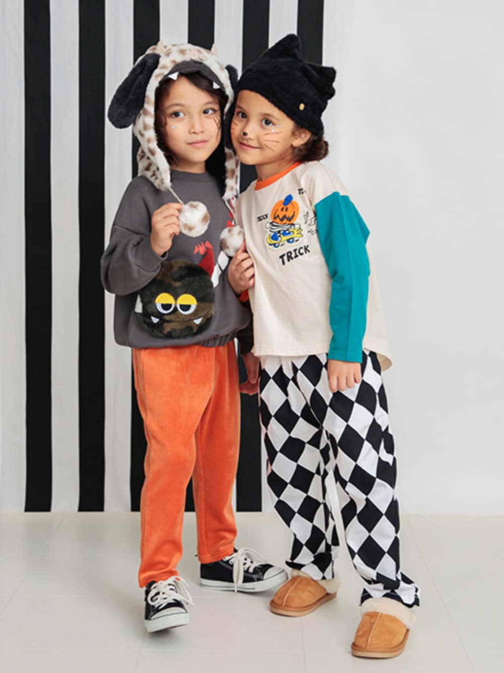 「F.O.Online Store、エフオーオンラインストア(F.O.Online Store)、BREEZE、ブリーズ、halloween、ハロウィン、ハロウィンコーデ、テーマパークコーデ、モンスター、パンプキン、カラーコーデ、ワイドパンツ、キッズコーデ、キッズファッション、秋コーデ」｜「BREEZEのNEW シェフパンツ（その他パンツ、ホワイト系）」を使った、F.O.OnlineStoreさん（キッズ・110cm）の秋コーディネートの1枚目の写真