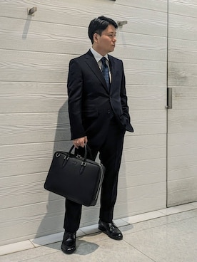 「アイテム（ビジネスバッグ）」を使った、かずさん（メンズ・165cm）の冬コーディネート