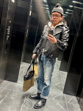 「FILSON（フィルソン）のアイテム」を使った、WeiChou Chenさん（メンズ・171cm）の冬コーディネート