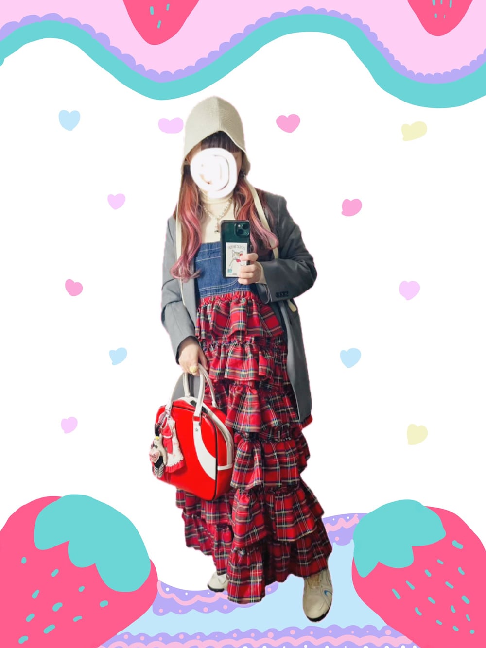 レッド系のジャンパースカート、グレー系のテーラードジャケット、レッド系のボストンバッグを着用したレディースの冬コーディネートの1枚目の写真