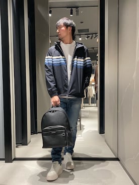 「ARMANI EXCHANGE（アルマーニエクスチェンジ）の【A|X アルマーニ エクスチェンジ】レースアップスニーカー（スニーカー、ホワイト系）」を使った、Yoshiさん（メンズ・181cm）の春コーディネート