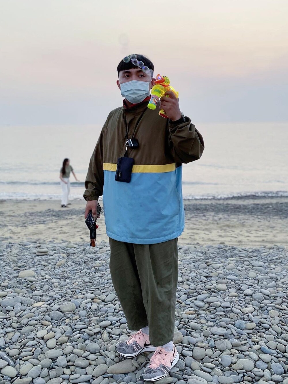 「NIKE、JKS shop、UNIQLO、JW Anderson x UNIQLO、cordura」｜「NIKEのアイテム（シューズ、ピンク系）」を使った、yiiio8eoさん（メンズ・164cm）の春コーディネートの1枚目の写真