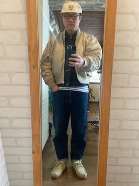 「アイテム（MA-1、ベージュ系）」を使った、キャサさん（メンズ・171cm）の冬コーディネート