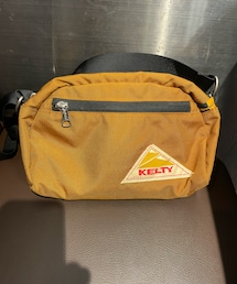 KELTY | ガンダムのコアブロックの下の黄色をバッグを使って表現しました。(ショルダーバッグ)
