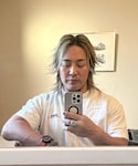 CDG(シーディージー)の「トップス(Tシャツ/カットソー)」