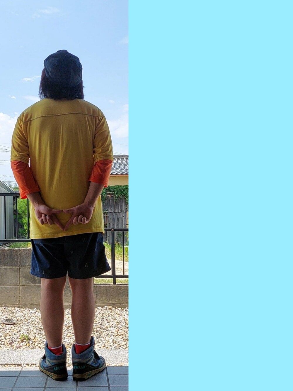 イエロー系のTシャツ/カットソー、オレンジ系のTシャツ/カットソー、ブルー系のその他パンツを着用したメンズの夏コーディネートの2枚目の写真