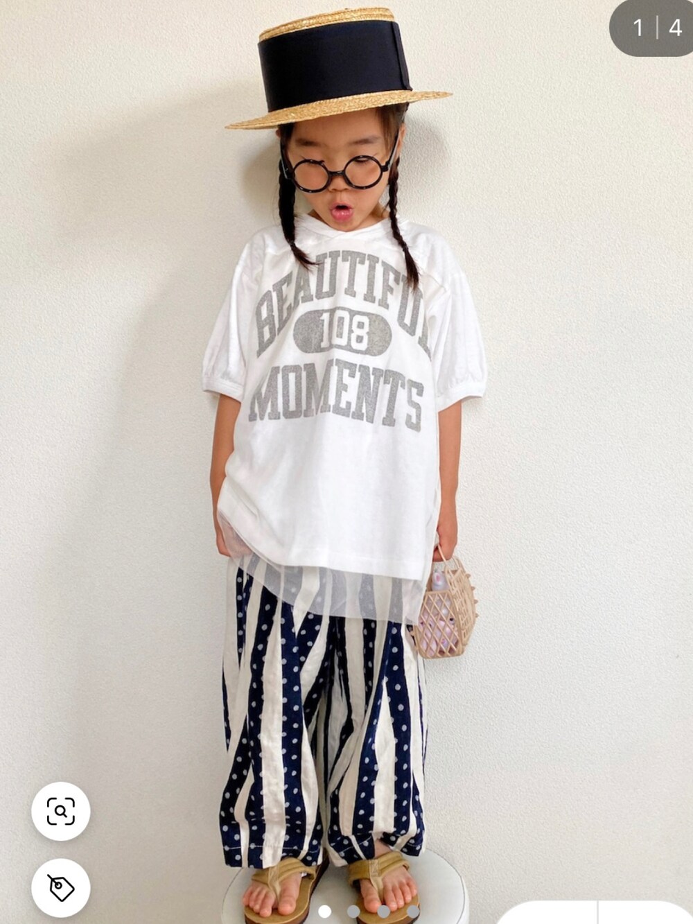 ブラウン系のTシャツ/カットソー、ブラック系のサンダル、その他のその他パンツを着用したキッズの夏コーディネートの2枚目の写真