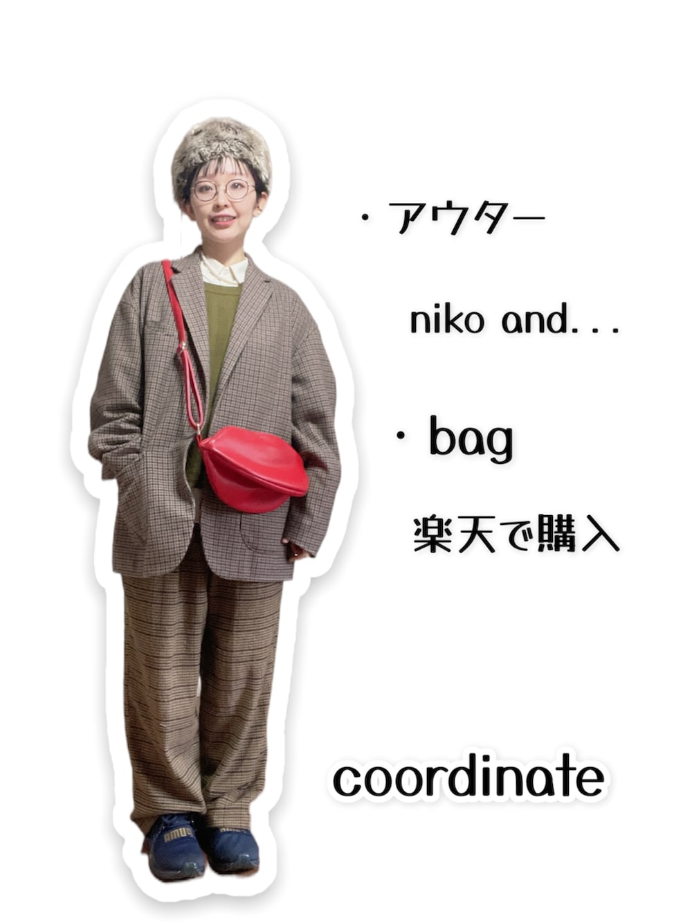 ベージュ系のテーラードジャケット、ブラウン系のその他パンツ、ブルー系のスニーカーを着用したレディースの冬コーディネートの2枚目の写真