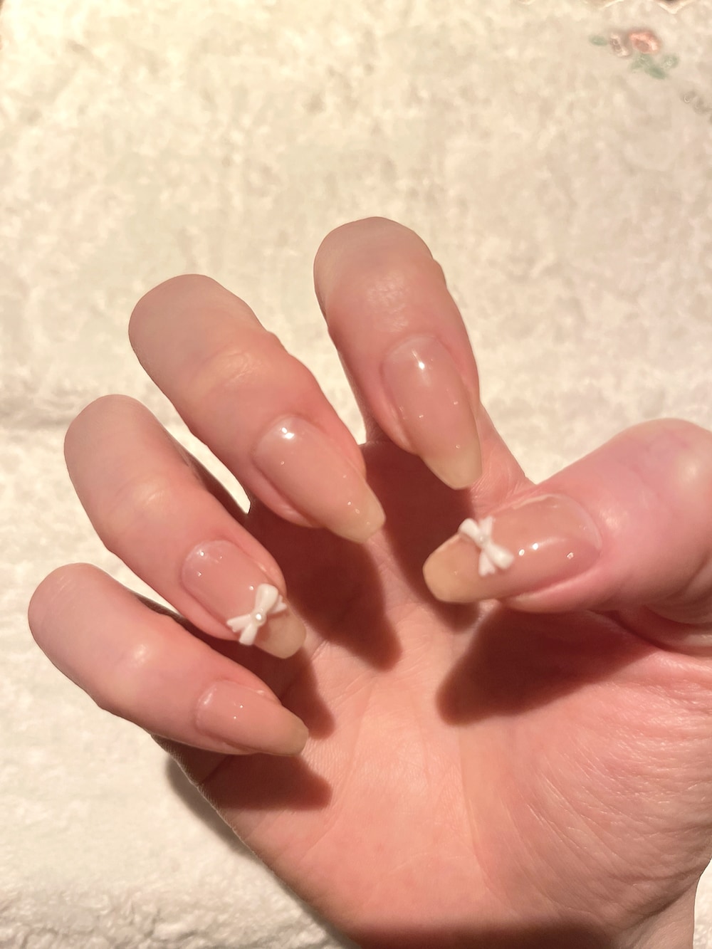 ピンク系のその他を着用したレディースの冬コーディネートの2枚目の写真