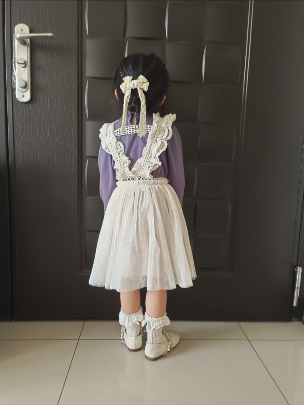 「Strawberry Coral のアイテム（その他トップス、パープル系）」を使った、點點さん（キッズ・90cm）の冬コーディネートの3枚目の写真