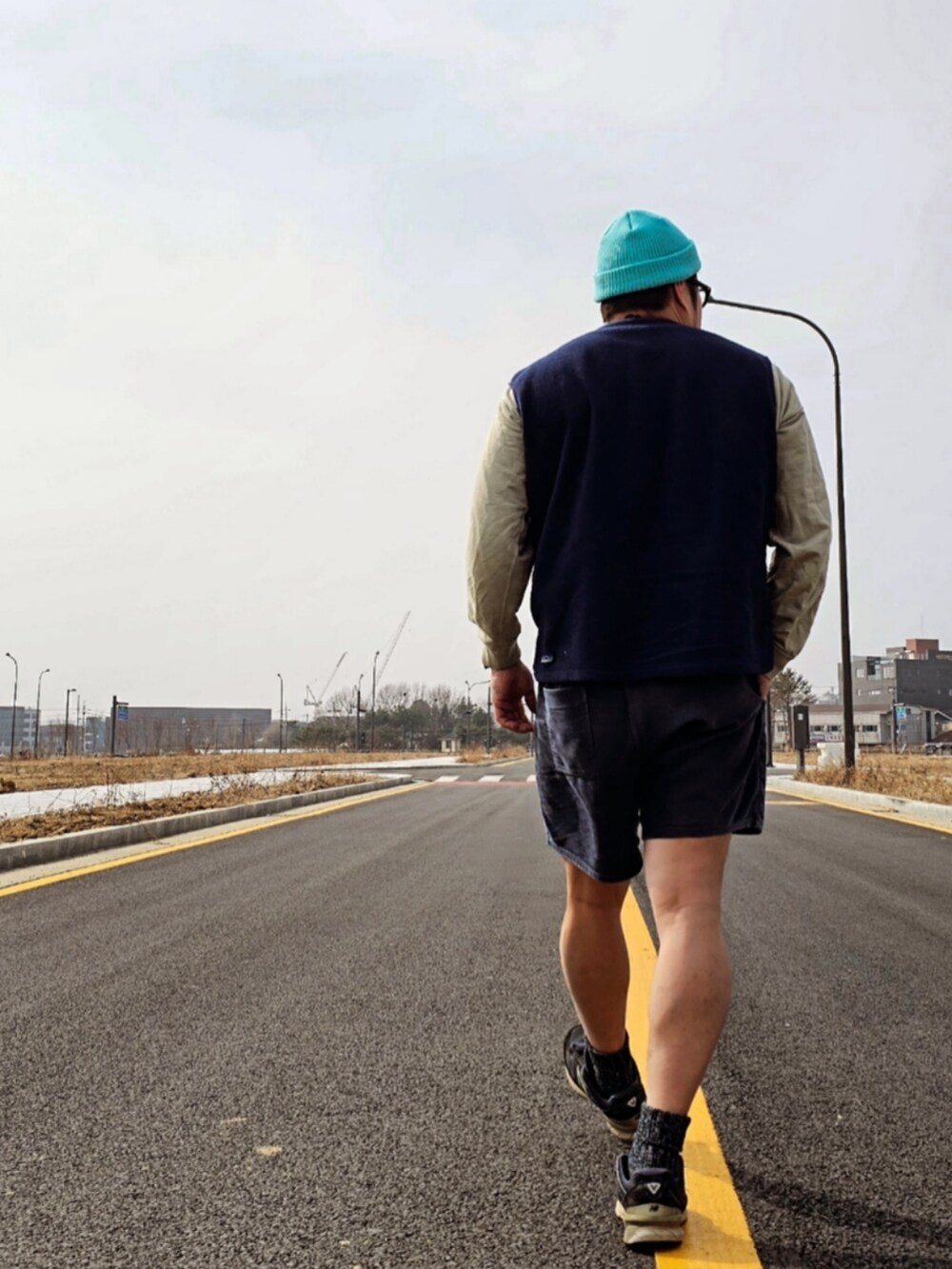 「patagonia、Ocean pacific、AURALEE、balansa、New Balance、990v5、bicycle」｜「AURALEEのアイテム（Tシャツ/カットソー、ベージュ系）」を使った、Herringさん（メンズ・178cm）の春コーディネートの2枚目の写真