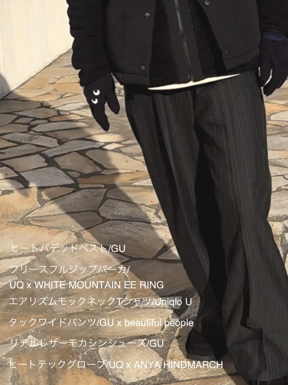 ブラック系のサングラスを着用したメンズの冬コーディネートの2枚目の写真