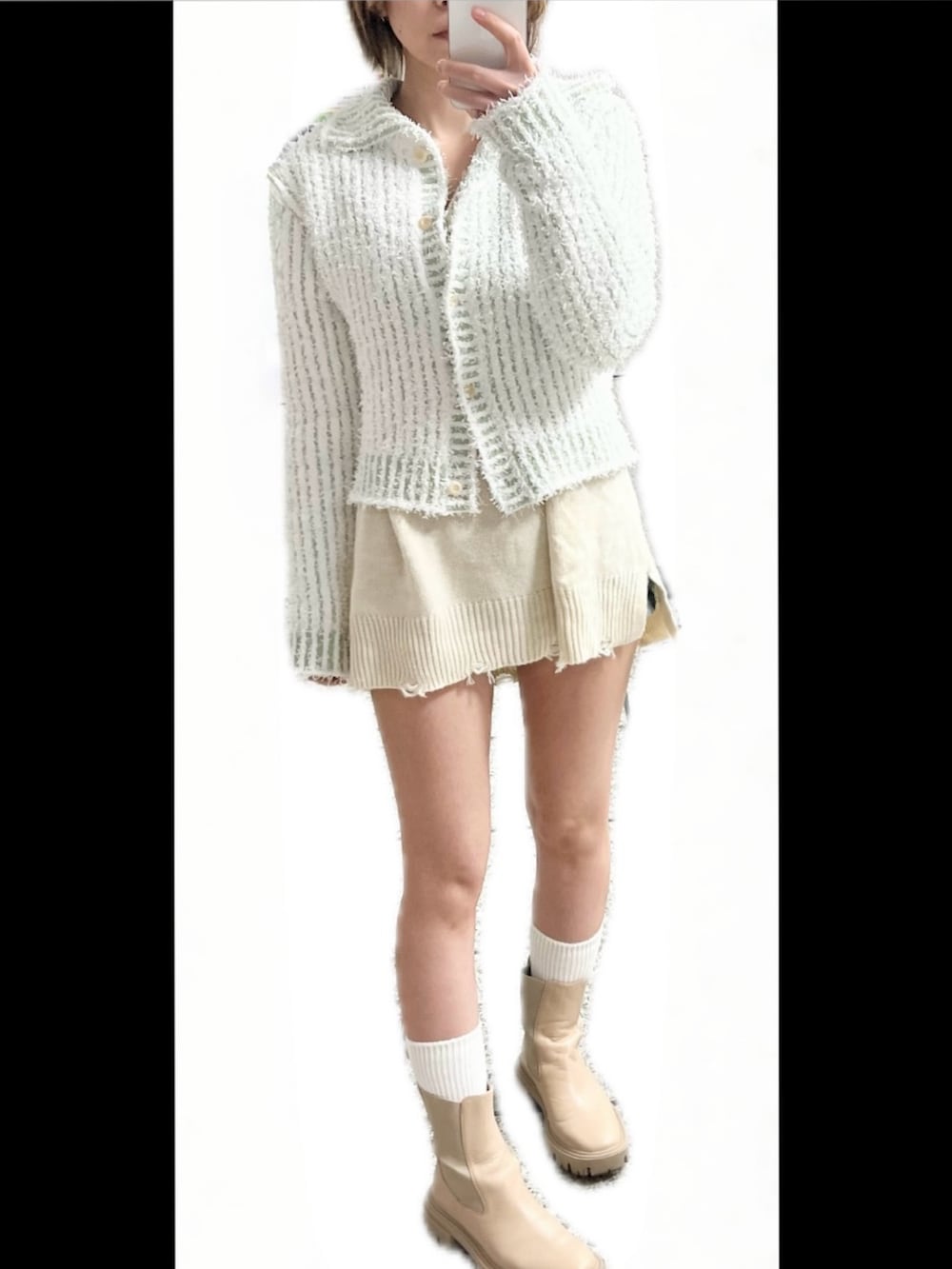 ブラック系のジャケット/アウター、ブラック系のハンドバッグ、その他のカーディガン/ボレロを着用したレディースの春コーディネートの2枚目の写真