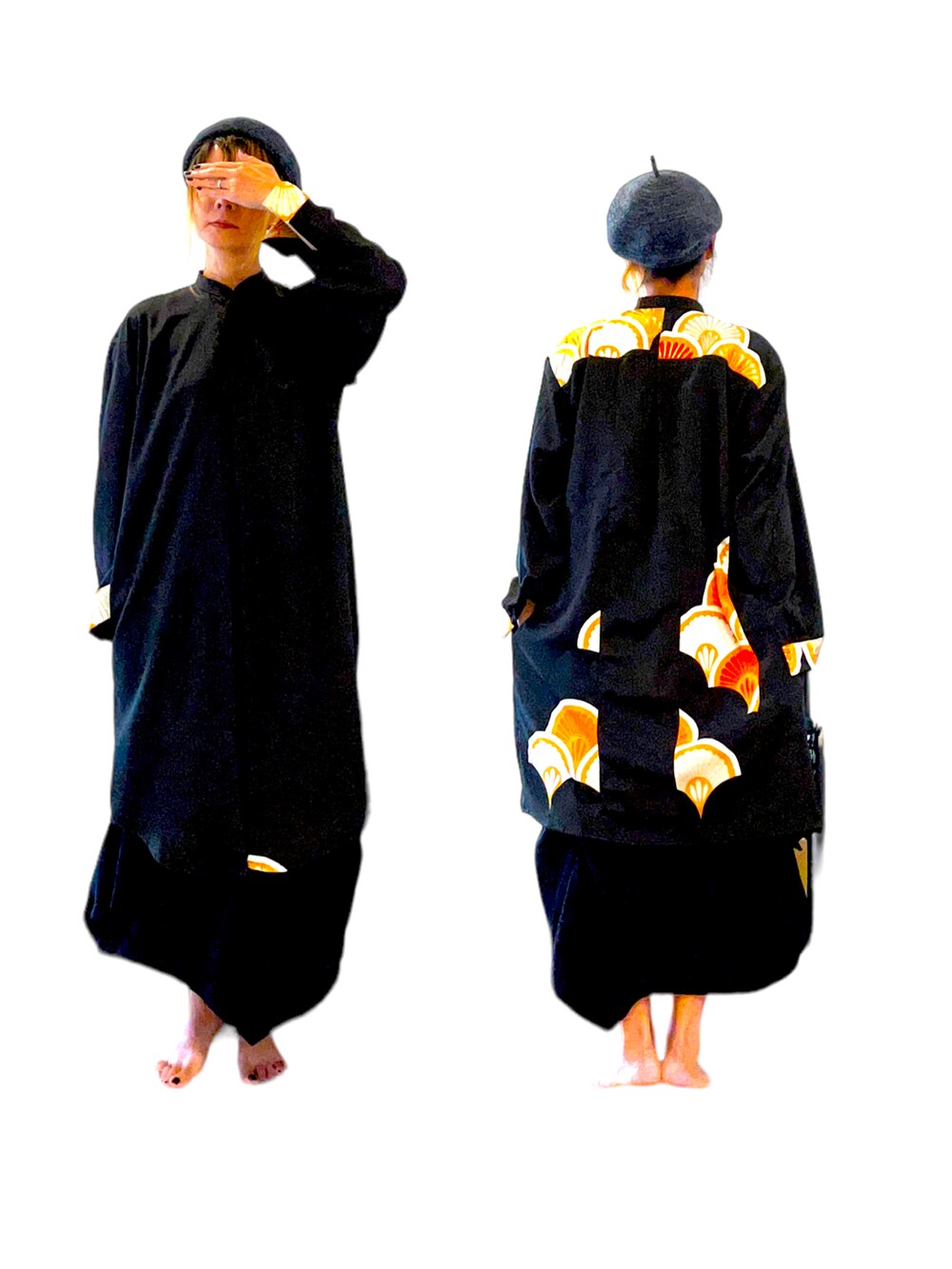 ブラック系のその他アウターを着用したレディースの秋コーディネートの2枚目の写真