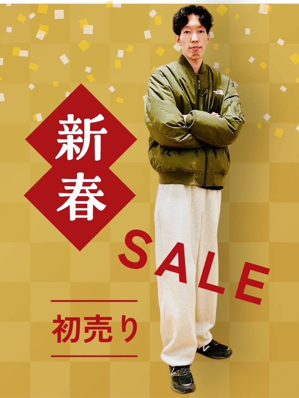 グリーン系のブルゾンを着用したメンズの冬コーディネートの3枚目の写真