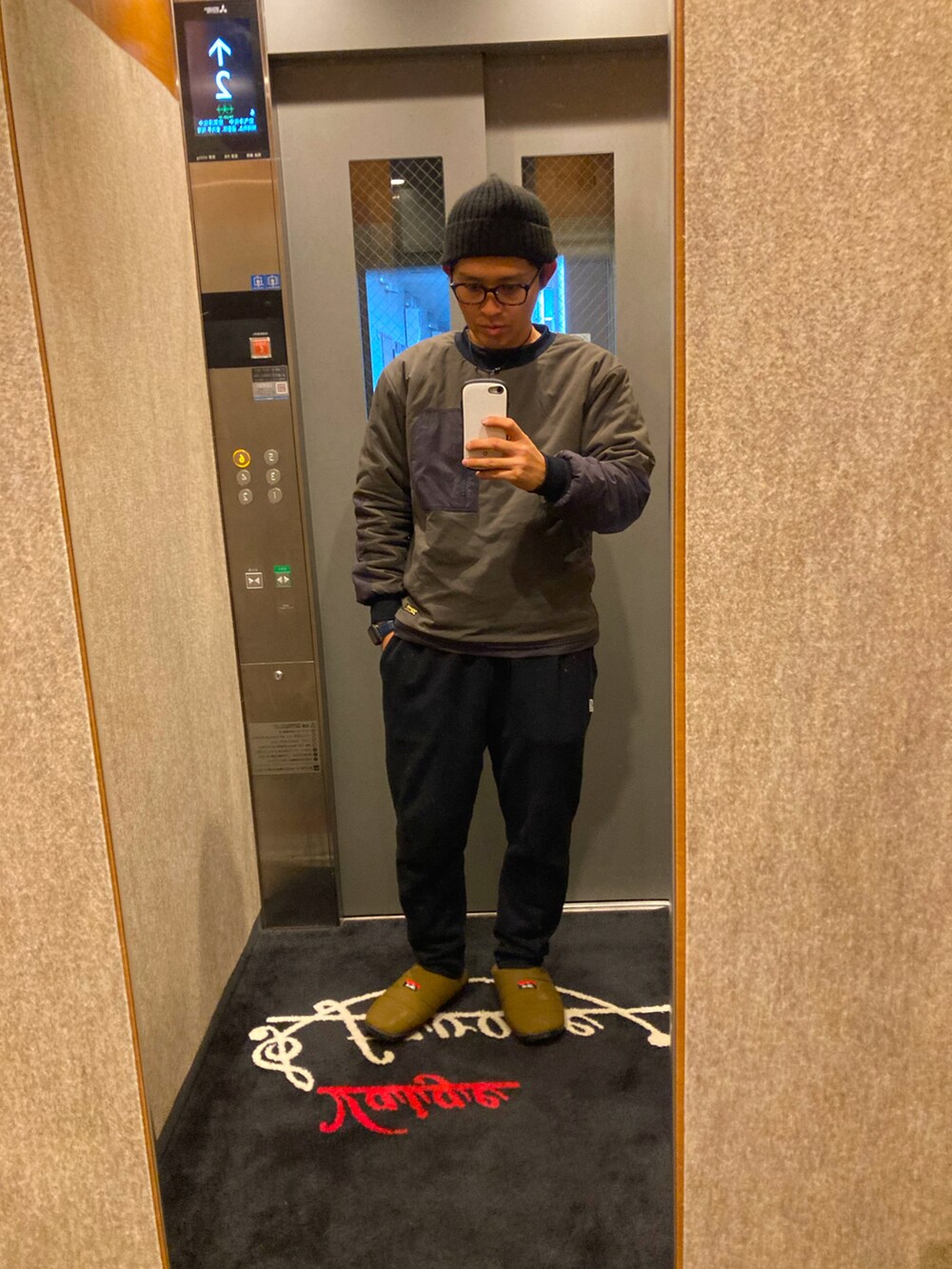 「THE NORTH FACEのアイテム（ニットキャップ/ビーニー、ブラック系）」を使った、00331169さん（メンズ・166cm）の冬コーディネートの2枚目の写真