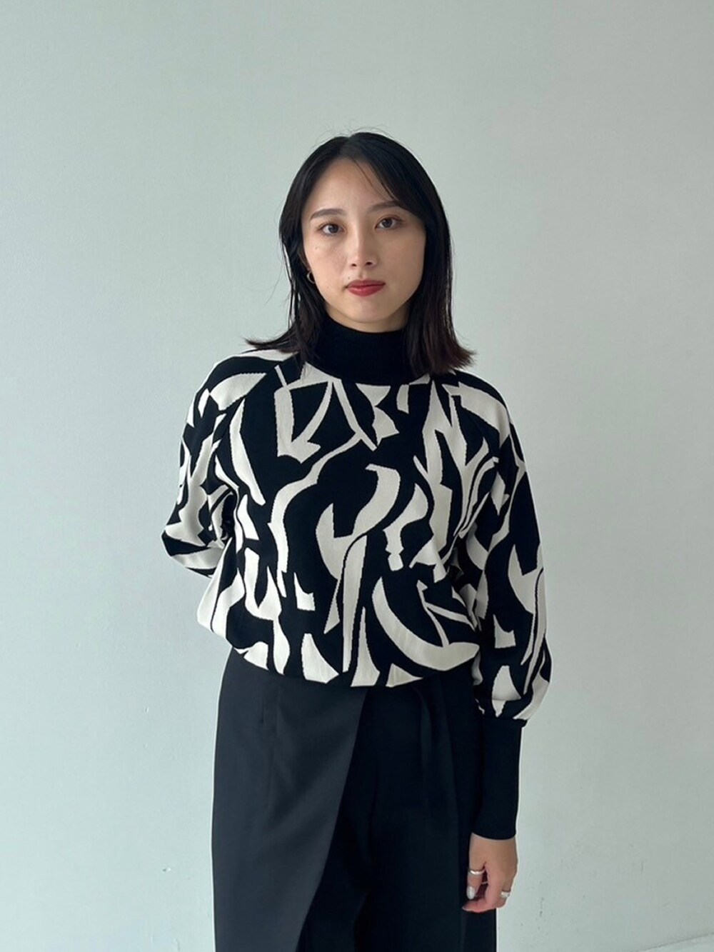 その他のニット/セーターを着用したレディースの秋コーディネートの3枚目の写真