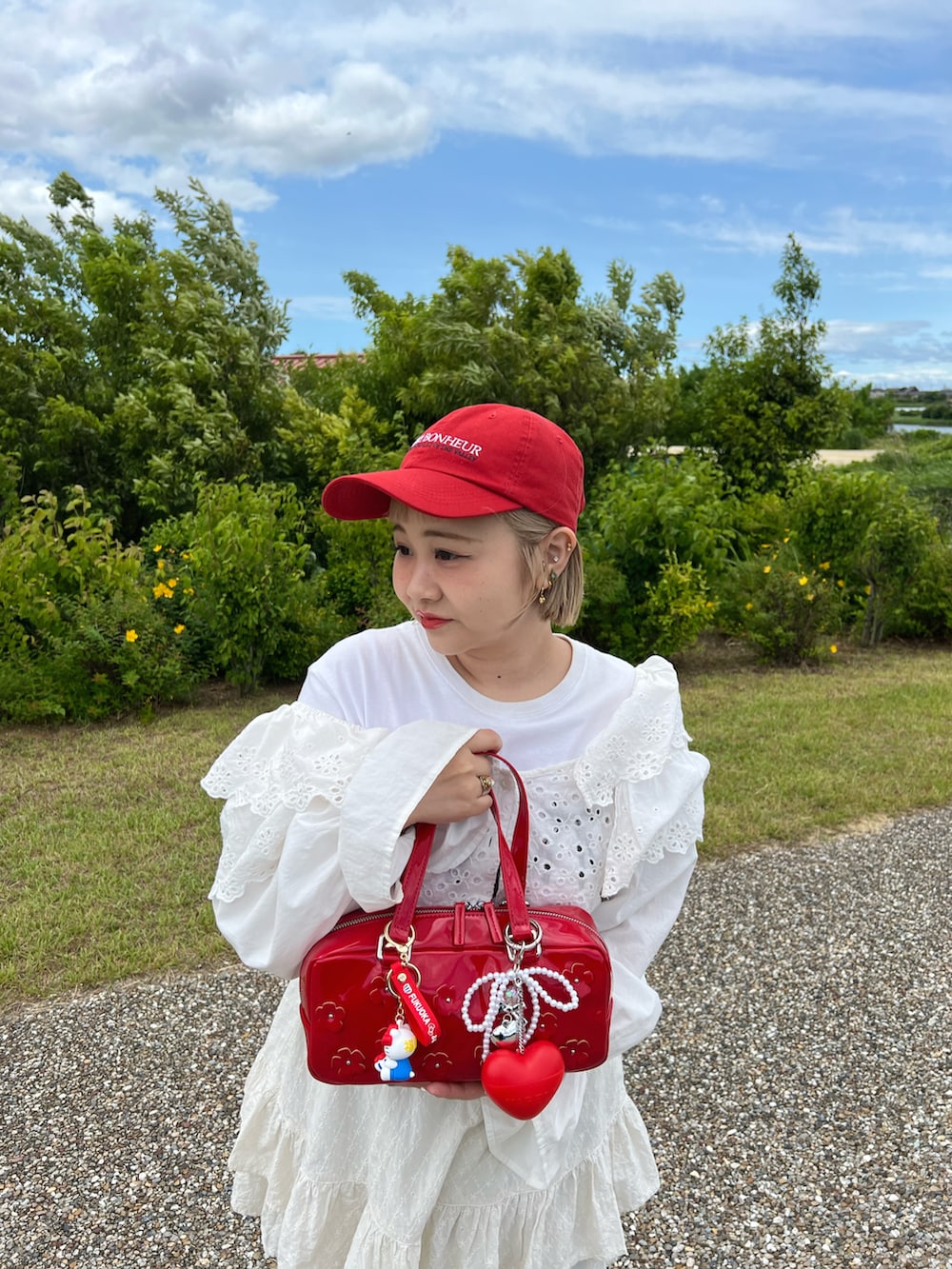 レッド系のハンドケア/ハンドクリーム、その他のその他を着用したレディースの夏コーディネートの2枚目の写真