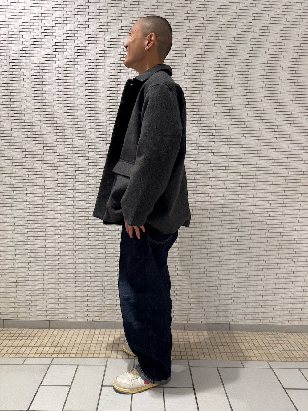 その他のカバーオールを着用したメンズの冬コーディネートの2枚目の写真