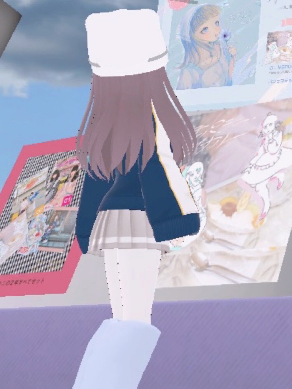 ブルー系のワンピース、ホワイト系のダウンジャケット/コート、ホワイト系のニットキャップ/ビーニーを着用したレディースの冬コーディネートの2枚目の写真