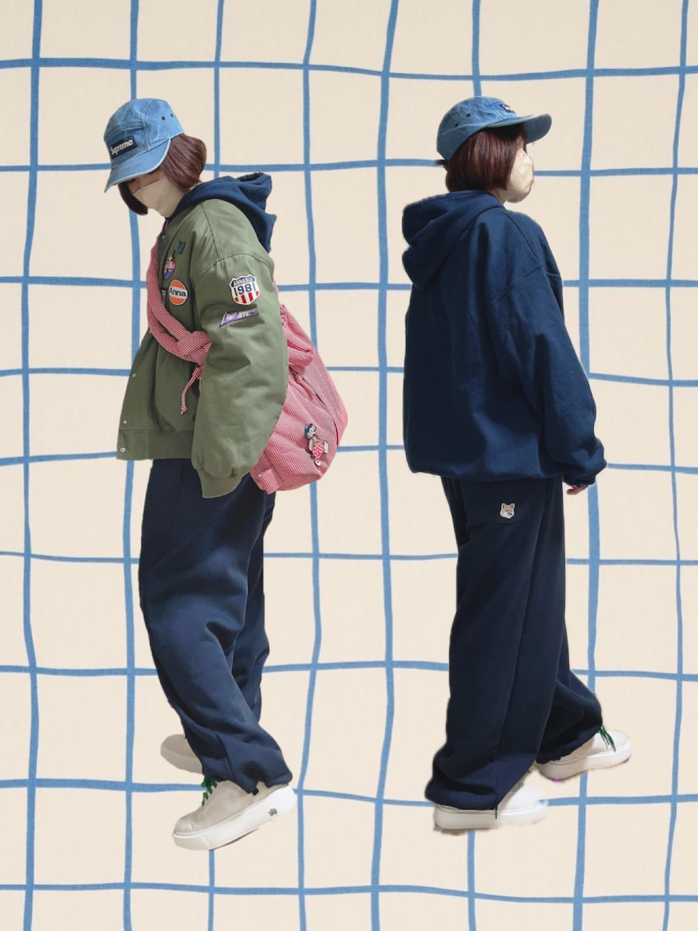 ブルー系のパーカー、グリーン系のその他アウター、レッド系のバッグを着用したレディースの春コーディネートの2枚目の写真