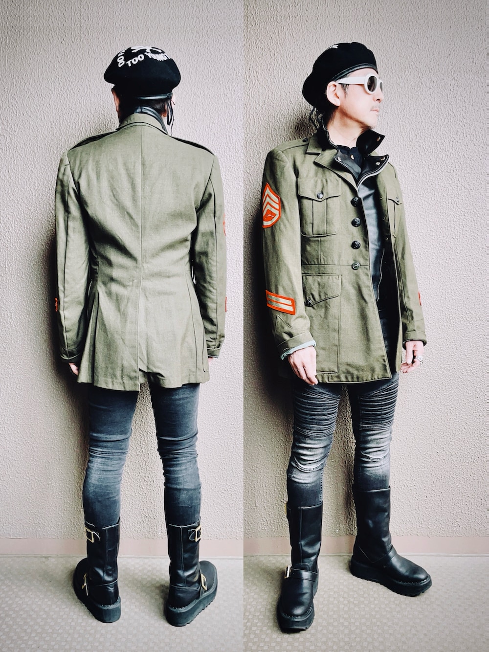 グリーン系のミリタリージャケット、ブラック系のライダースジャケット、ブラック系のデニムパンツを着用したメンズの冬コーディネートの4枚目の写真