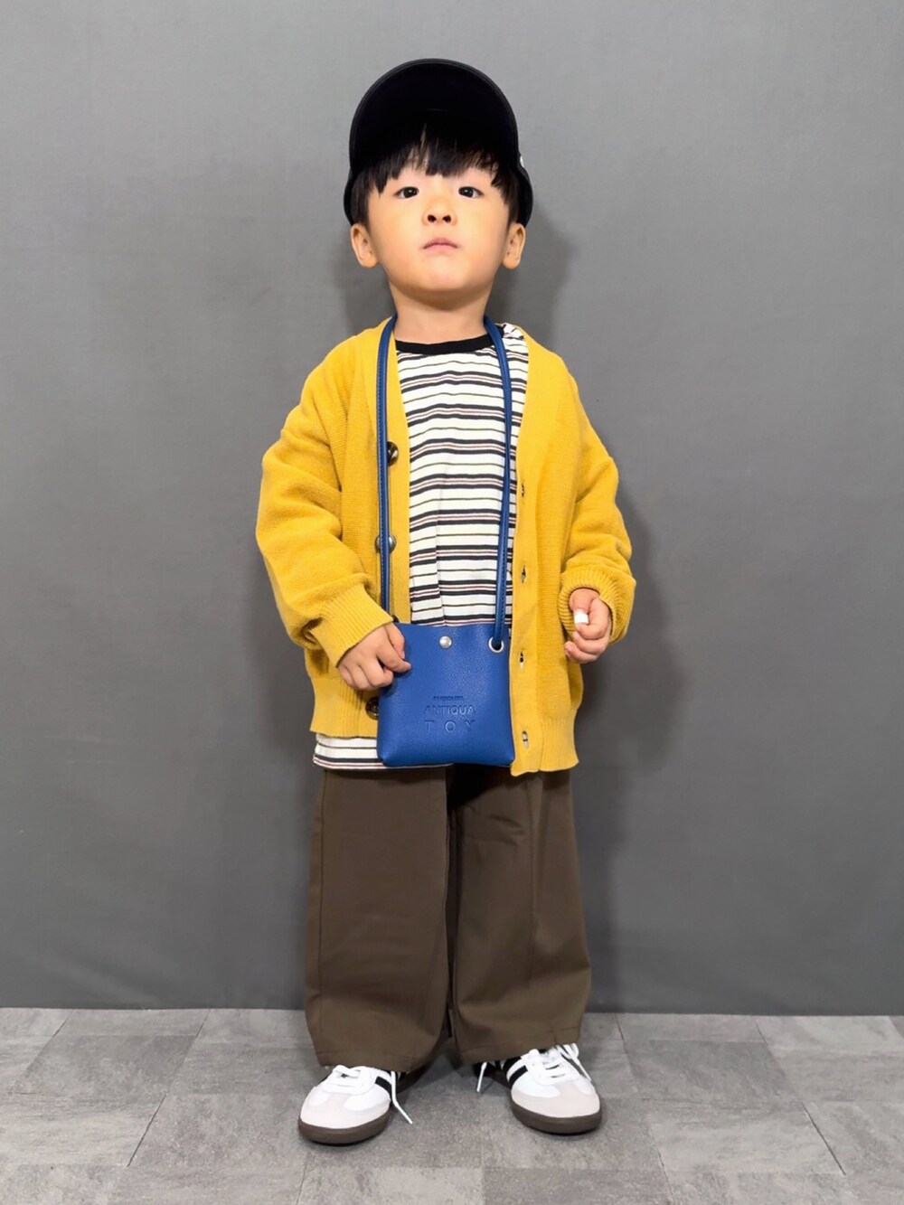 「秋っぽコーデ更新中、秋コーデ、ロンT、カーディガン、レイヤードスタイル、スラックス、キャップ、スニーカー、ショルダーバッグ、韓国子供服、ブラウン、スポーツミックス、お出かけコーデ、ニット、パステルカラー」｜「F.O.KIDSの【マシンウォッシャブル】カラバリカーディガン（カーディガン/ボレロ、イエロー系）」を使った、YU⭐︎さん（キッズ・90cm）の秋コーディネートの5枚目の写真