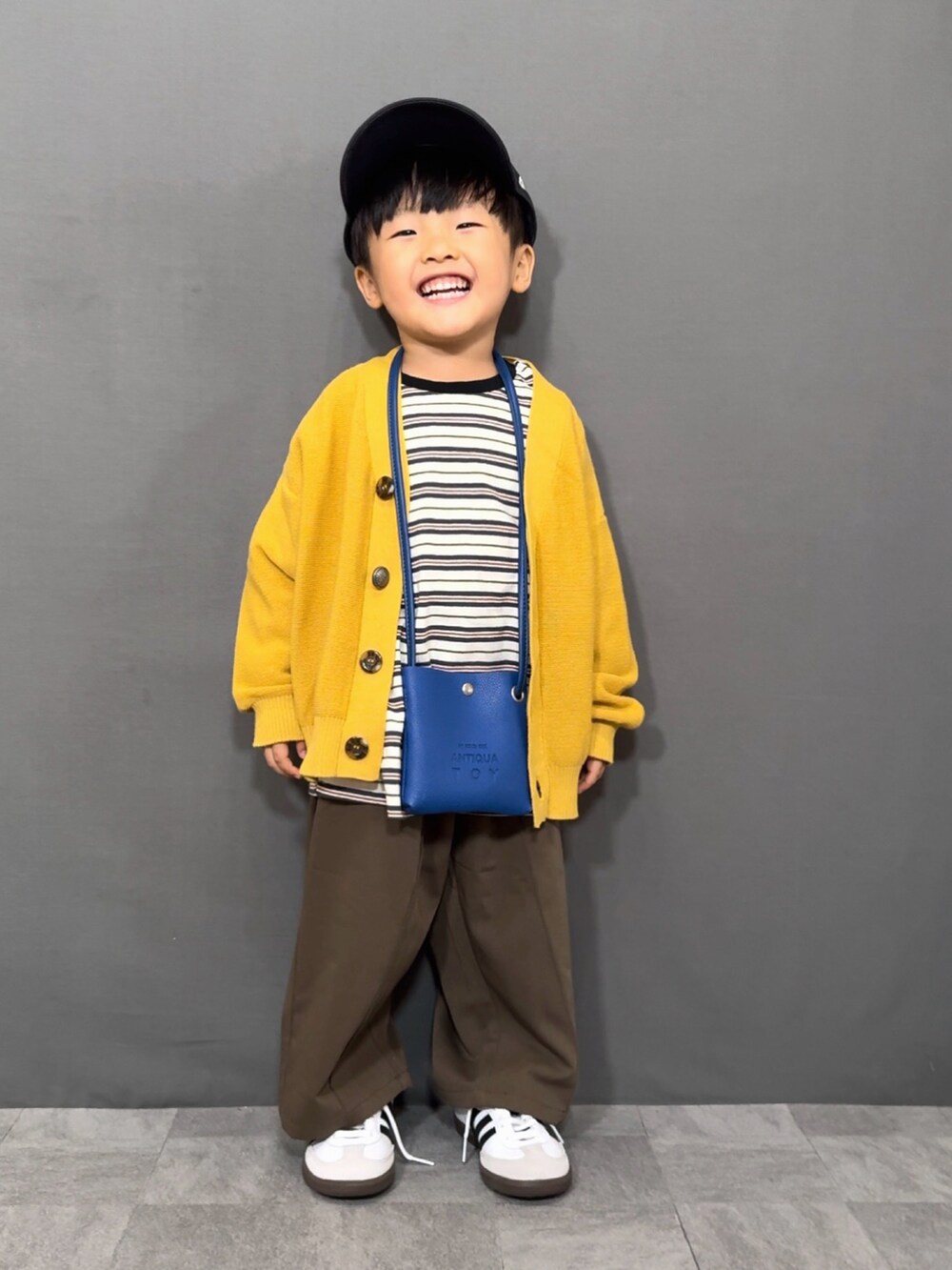 「秋っぽコーデ更新中、秋コーデ、ロンT、カーディガン、レイヤードスタイル、スラックス、キャップ、スニーカー、ショルダーバッグ、韓国子供服、ブラウン、スポーツミックス、お出かけコーデ、ニット、パステルカラー」｜「F.O.KIDSの【マシンウォッシャブル】カラバリカーディガン（カーディガン/ボレロ、イエロー系）」を使った、YU⭐︎さん（キッズ・90cm）の秋コーディネートの4枚目の写真