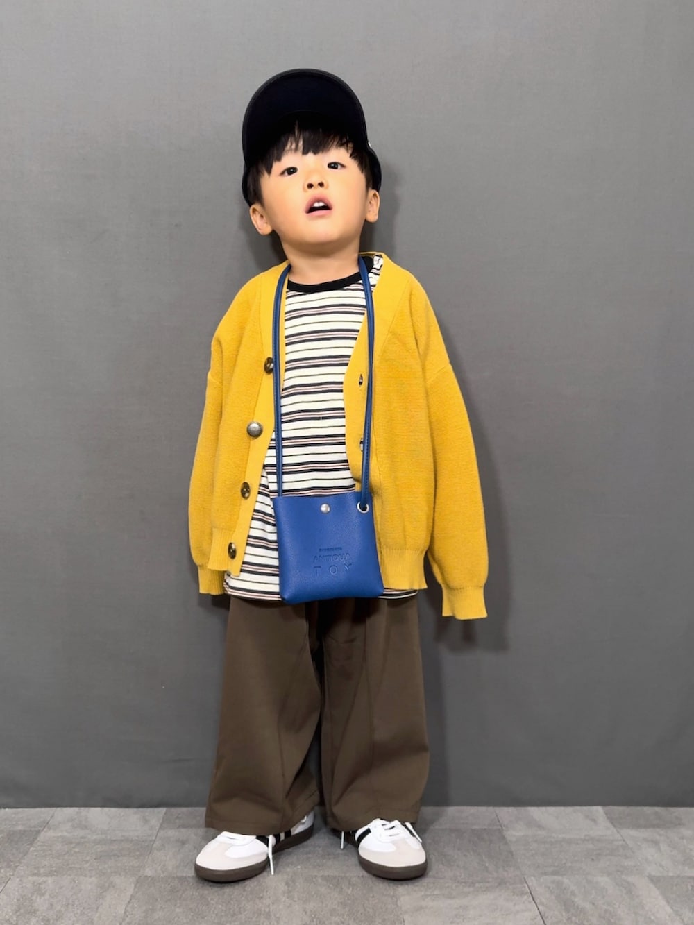 「秋っぽコーデ更新中、秋コーデ、ロンT、カーディガン、レイヤードスタイル、スラックス、キャップ、スニーカー、ショルダーバッグ、韓国子供服、ブラウン、スポーツミックス、お出かけコーデ、ニット、パステルカラー」｜「F.O.KIDSの【マシンウォッシャブル】カラバリカーディガン（カーディガン/ボレロ、イエロー系）」を使った、YU⭐︎さん（キッズ・90cm）の秋コーディネートの3枚目の写真