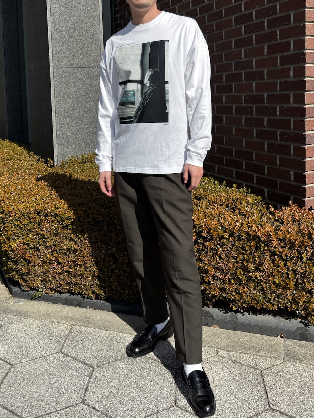 ブラック系のバックパック/リュックを着用したメンズの冬コーディネートの2枚目の写真