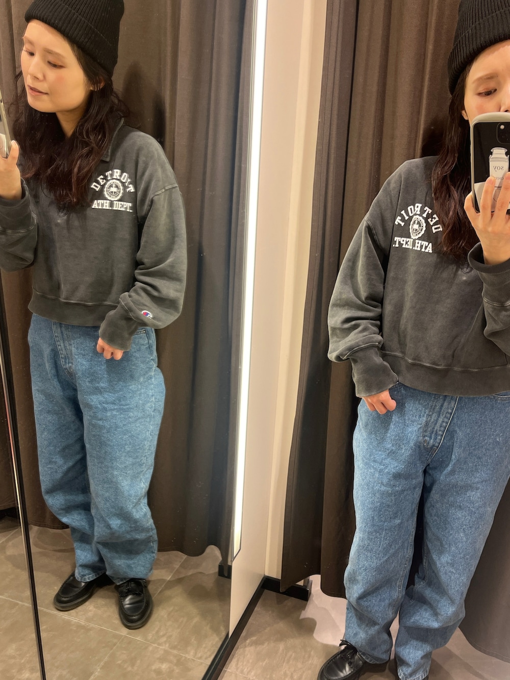 ブラック系のスウェット、ブルー系のデニムパンツ、ブラック系のローファーを着用したレディースの春コーディネートの3枚目の写真