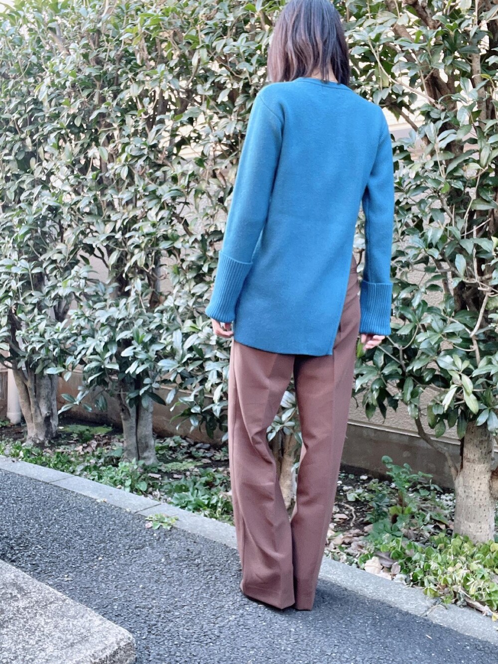 「CLANE、ZARA、チョコ色に染まれ、CENE、冬コーデ、ブーツ、パンツスタイル、きれいめカジュアル、オトナカジュアル、オトナ女子、大人カジュアル、ニット、スリット、ファーコート」｜「ZARAのアイテム（パンツ、ブラウン系）」を使った、nico＊さん（レディース・168cm）の冬コーディネートの4枚目の写真
