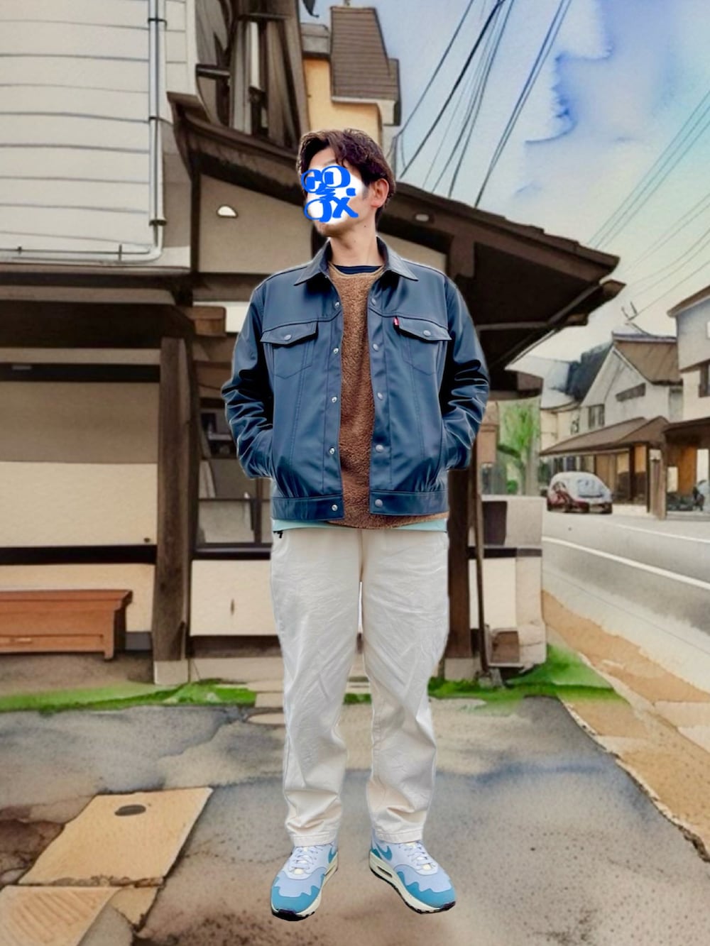 ブラック系のブルゾン、ベージュ系のトップス、ブルー系のトップスを着用したメンズの冬コーディネートの2枚目の写真