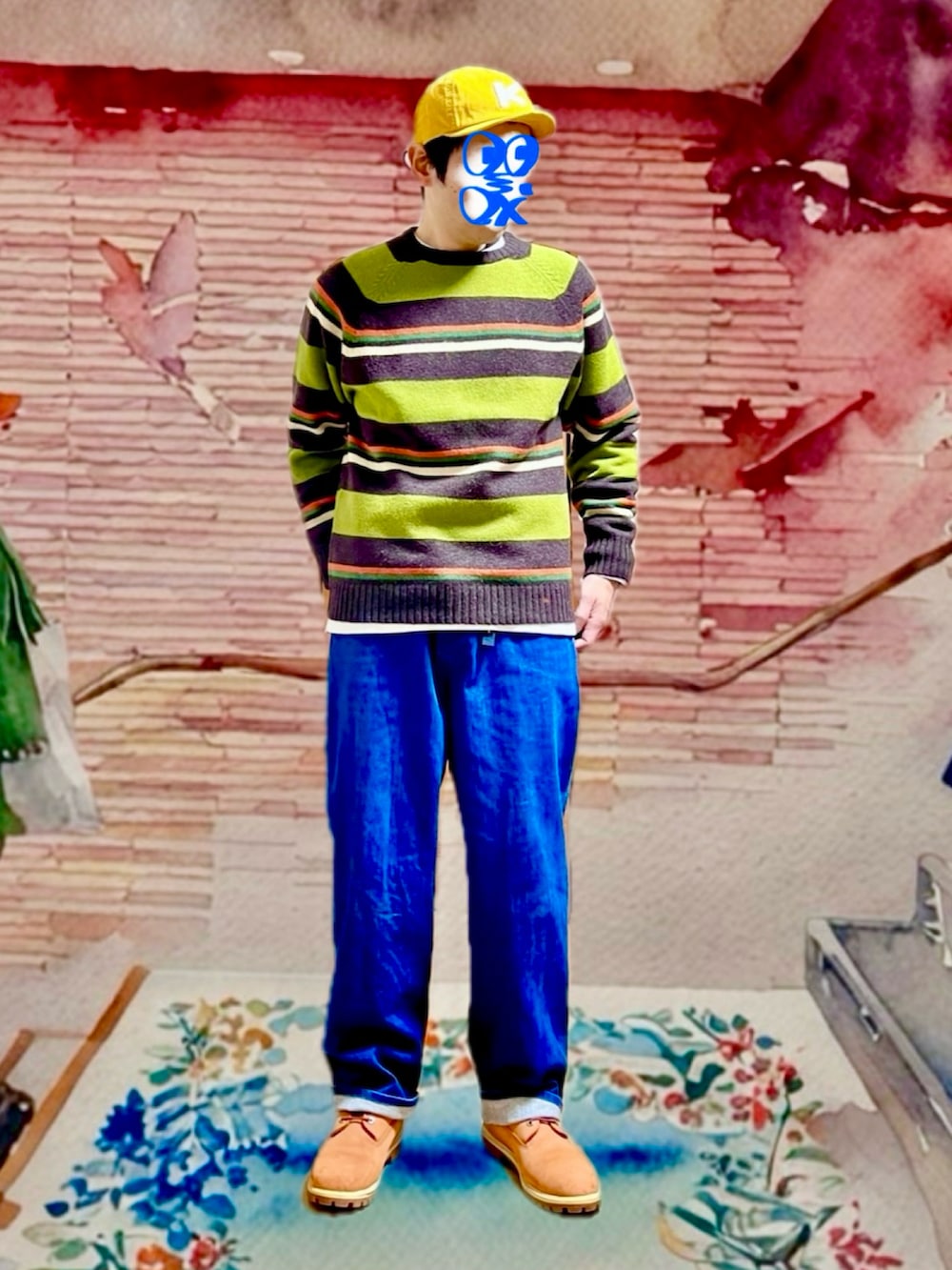 ブラック系のその他アウター、ブルー系のデニムパンツ、その他のニット/セーターを着用したメンズの冬コーディネートの4枚目の写真