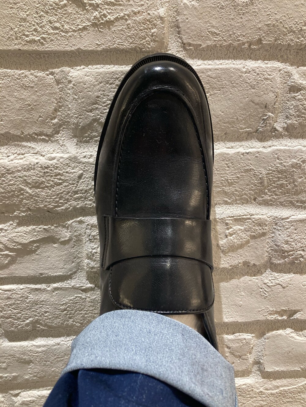 ブラック系のブーツ、ブラウン系のブーツを着用したメンズの冬コーディネートの5枚目の写真