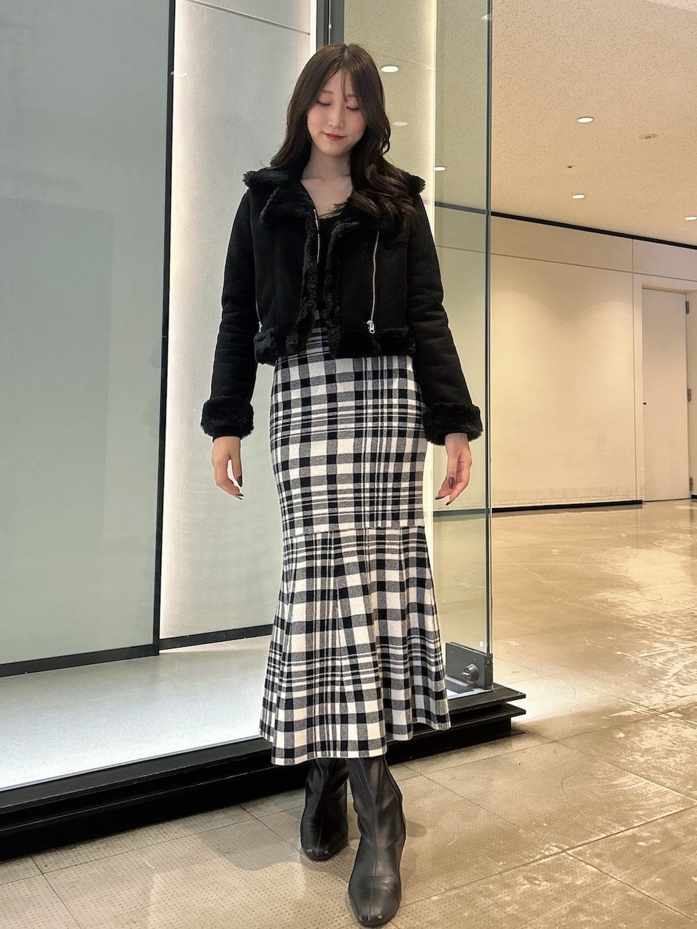 レディースの秋コーディネートの5枚目の写真