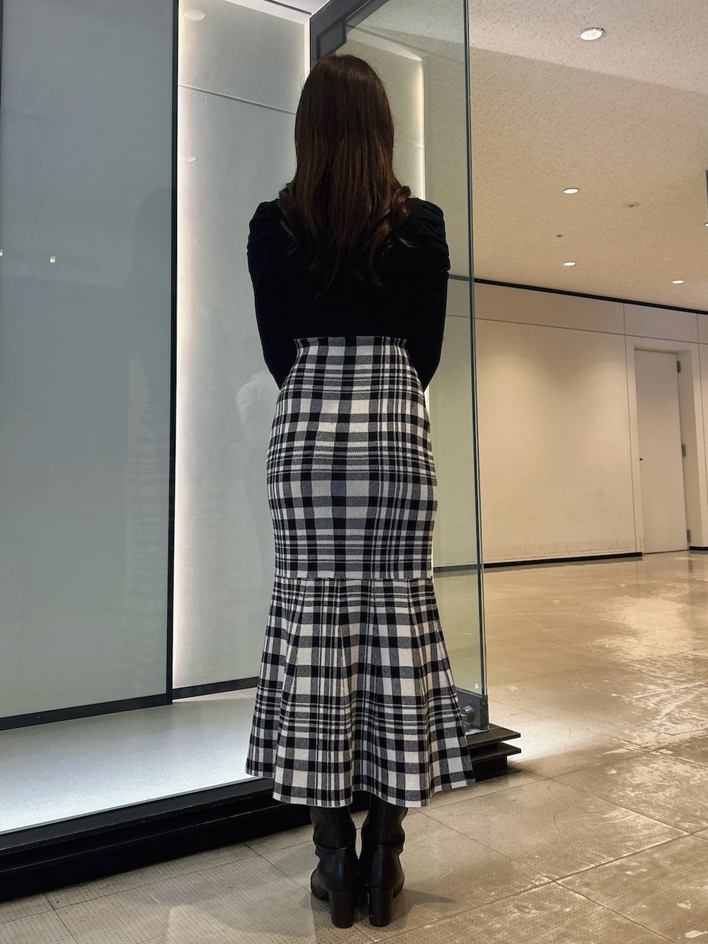 レディースの秋コーディネートの4枚目の写真