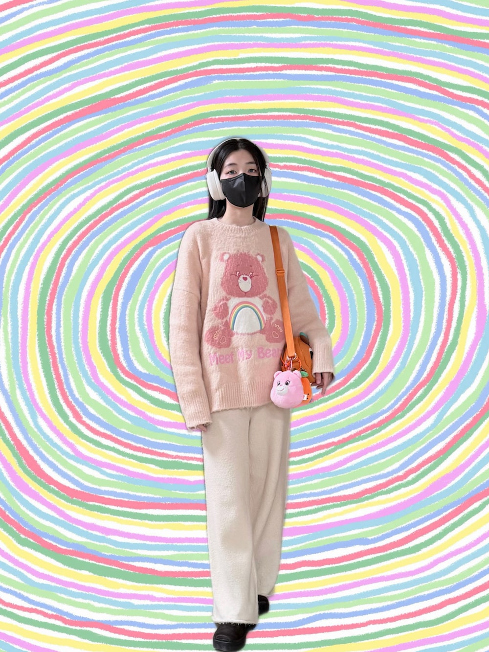 ピンク系のニット/セーター、ブラック系のノーカラージャケット、ベージュ系のパンツを着用したレディースの冬コーディネートの2枚目の写真