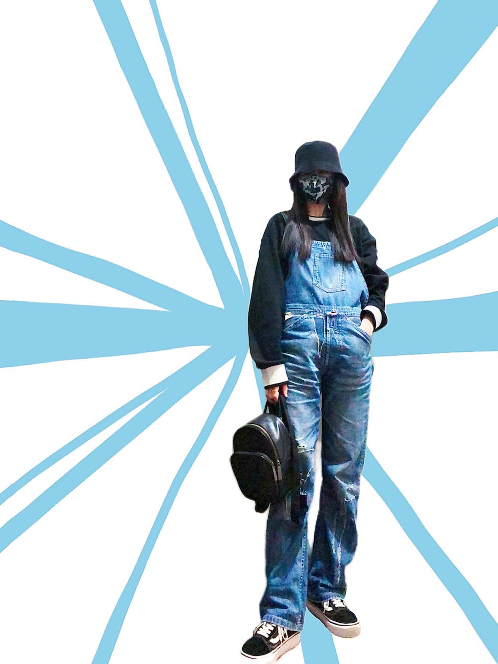 ブラック系のトップス、ブルー系のオールインワン・サロペット、ブラック系のバックパック/リュックを着用したレディースの冬コーディネートの3枚目の写真